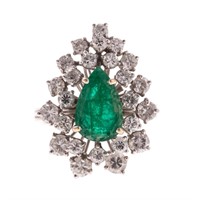 A Lady's Platinum Emerald and Diamond Ring