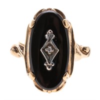 A Lady's 10K Black Onyx & Diamond Ring