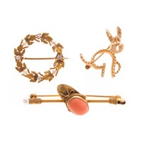 A Trio of Lady's Brooches in Gold