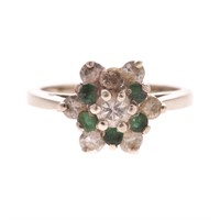 A Lady's Diamond and Emerald Ring in 14K