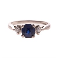 A Lady's Platinum Sapphire and Diamond Ring