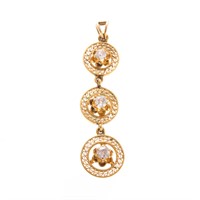 A Lady's Filigree Diamond Pendant in 18K