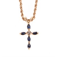 A Lady's Sapphire Cross on a Rope Necklace in 14K