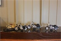 4 mini Harley Davidsons