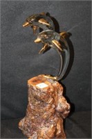 Glass Dolphins Sculpture on burl