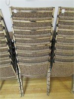 (8) - UPHOLSTERED BROWN STACKING CHAIRS