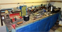 Lot, workbench full of tools, hardware, vice, and