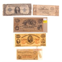 Four pieces of early currency