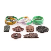 Group of jade bangle bracelets & hardstone amulets