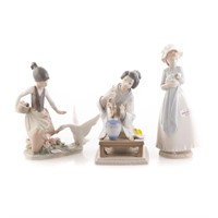 Two Lladro porcelain groups & Nao figure