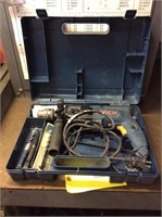 Bosch hammer drill with case and contents