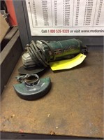 Angle grinder with shield