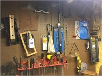 wall of tools on peg board