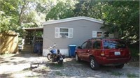 TWO HOMES & UTILITY SHED ON 80' X 150' LOT