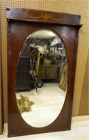 Urn and Drape Inlaid Oval Beveled Mirror.