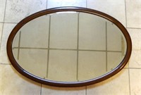 Oval Oak Framed Beveled Mirror.