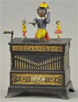 ORGAN BANK BOY AND GIRL MECHANICAL BANK