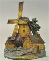 WINDMILL WITH COTTAGES DOORSTOP