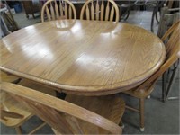 Round Oak Table with 6 Chairs and Leaf