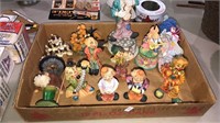 Box of 12 figurines mostly clowns, one is a music