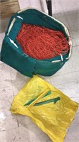 Canvas bag with large net and tent stakes