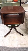 Mahogany pedestal table with storage underneath,