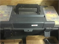 plastic toolbox with assorted items