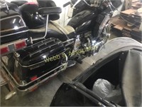 1982 Honda Goldwing motorcycle with helmet and