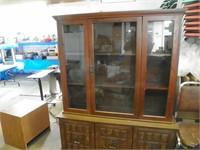 Very nice china cabinet, has two shelves in top