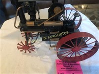 Handmade painted metal steam engine