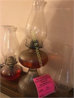 2 glass oil lamps and extra globe