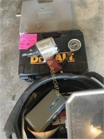 Various tools including compression gauge and