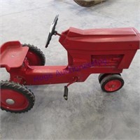 Red pedal tractor