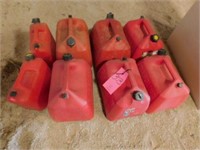8 plastic gas cans w/ air openings 5 gal & 2.5 gal