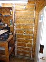 Shoe rack 22"w x 72" h   Bring tools to remove