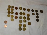 Assorted Euro coins, one from Mexico.