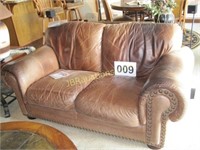 BROWN LEATHER LOVE SEAT