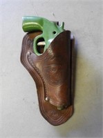 Antique RCMP Toy Pistol & Holder