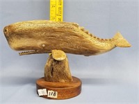 9 1/2" bone carving of a whale with inset baleen a