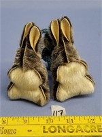 Pair of eskimo yo yo's made out of seal fur in the