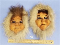 Pair of 9" hide masks with wolf trim and seal fur