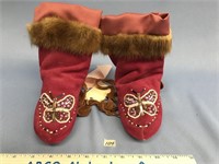 Suede baby mukluk with mink trim and butterfly bea