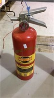 American La France fire extinguisher with full