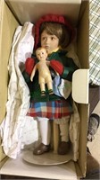 Norman Rockwell bisque head doll, with mini boy
