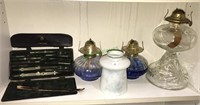 Three oil lamps, vintage drafting set, light
