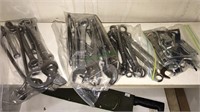 Four bags of wrenches and other tools, some