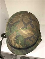 Army helmet with fiberglass liner and the