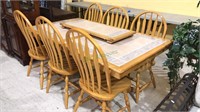 Dining table with six hoop back chairs, the table