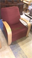 Modern reclining chair with wooden arms, 34