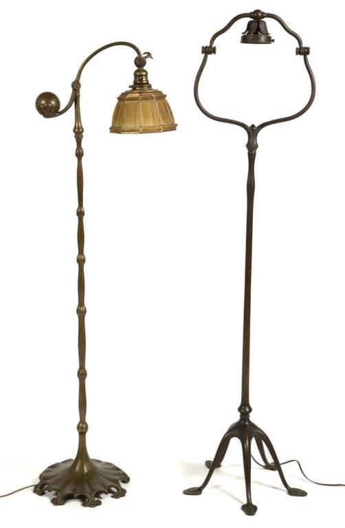 Tiffany bronze floor lamps, one counter-balance form with original linenfold shade